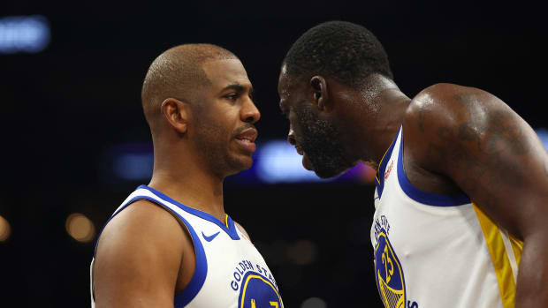 Golden State Warriors teammates Chris Paul and Draymond Green.